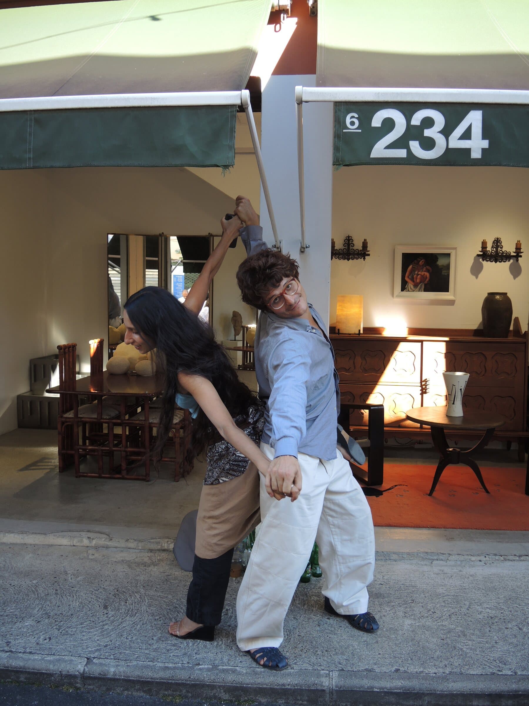 James Darle dancing on the pavement outside stand 234