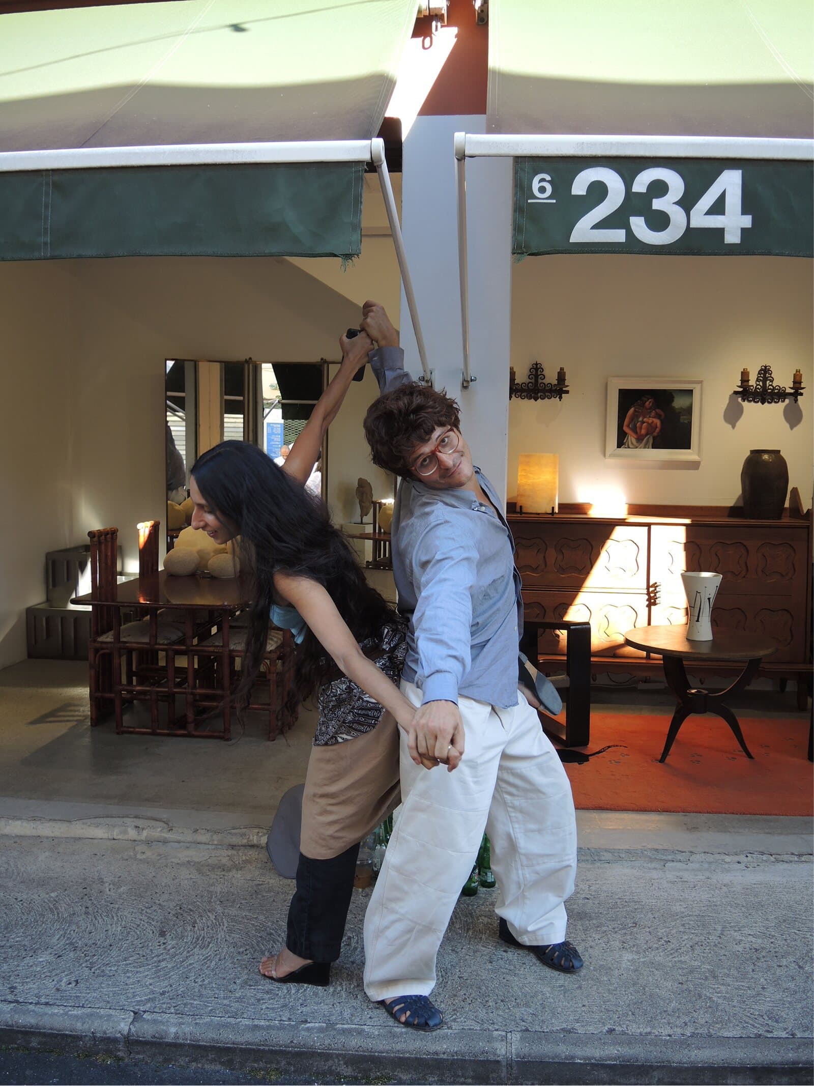 James Darle dancing on the pavement outside stand 234